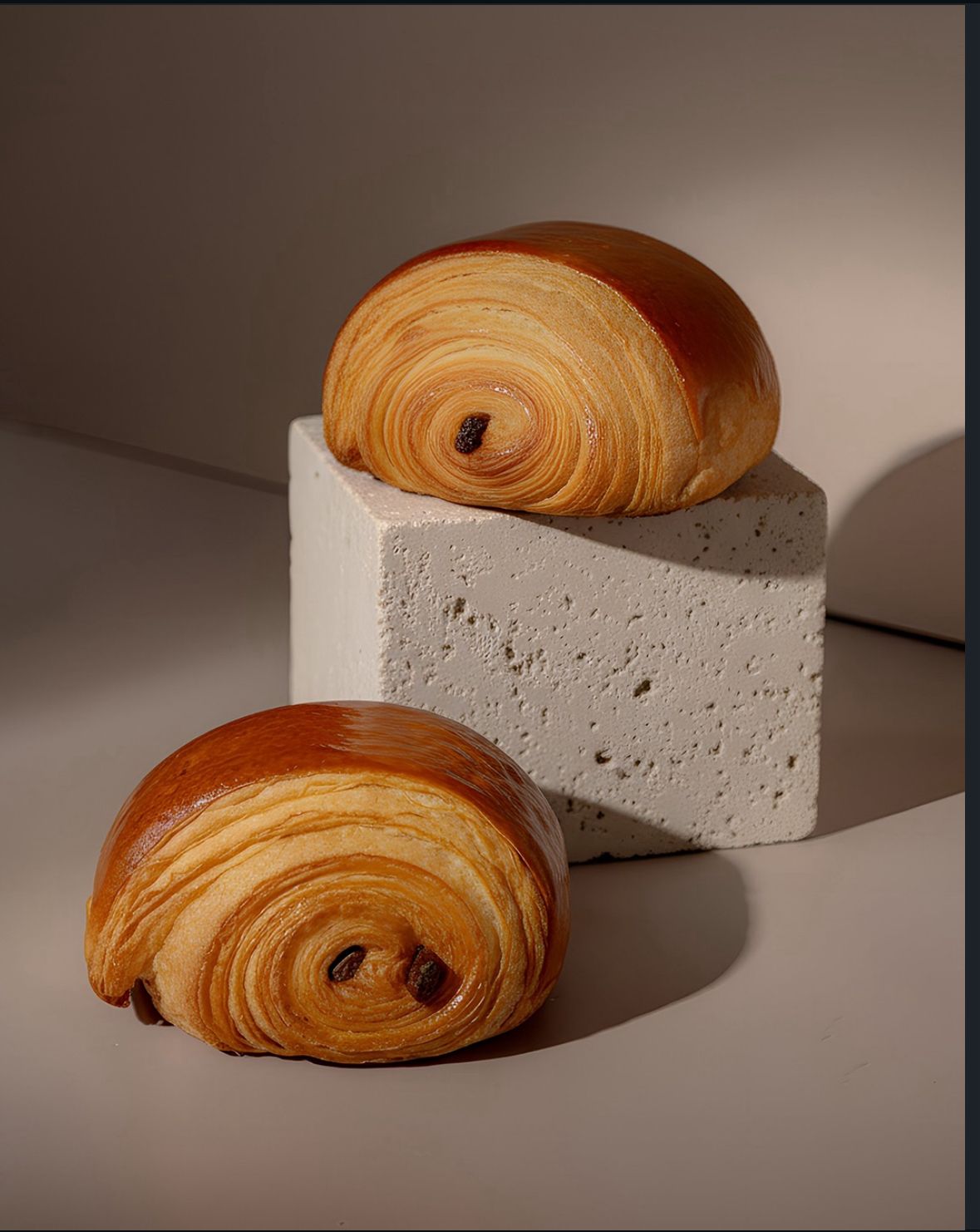 Pain au Chocolat — dark Valrhona chocolate inside golden laminated pastry