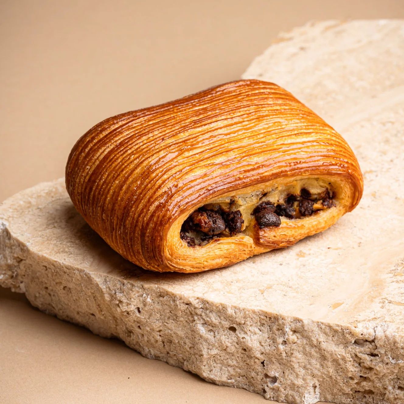Pain Suisse — vanilla custard and chocolate chips inside laminated pastry